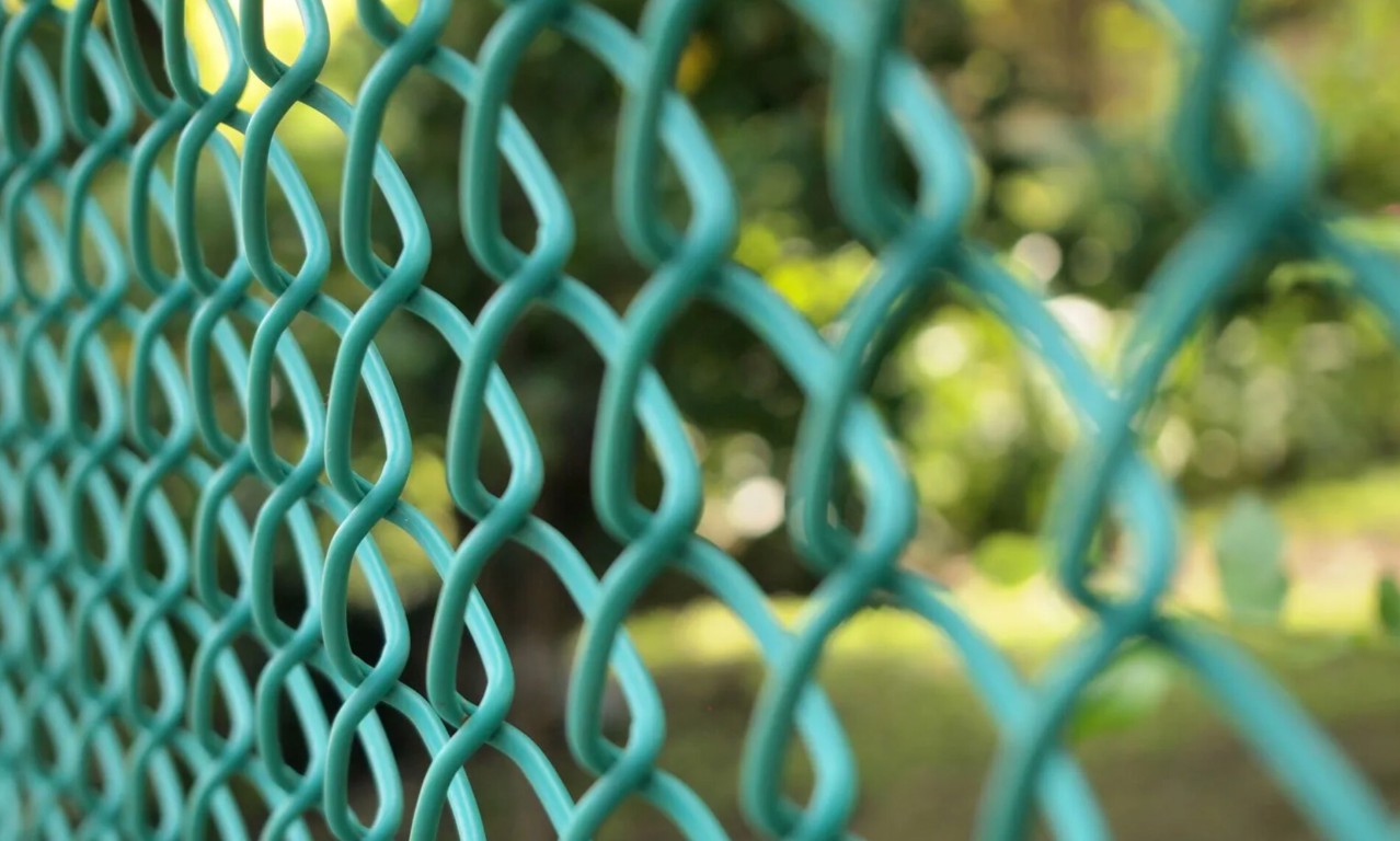 Green coated chain-link fence for residential property in Novato